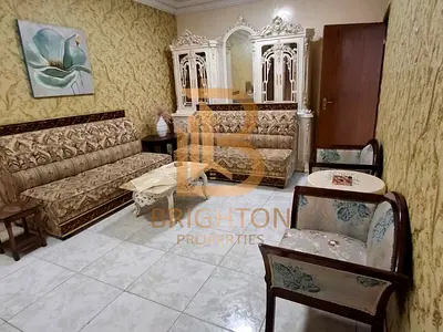 Charming 2 BR Apartment in Al Majaz 2: Modern Living