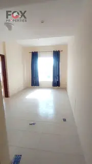 For sale: a one-bedroom apartment in Ajman, Garden City Towers, Al Hamidiya 1, in a prime, vibrant l