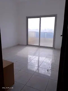 A family apartment with three bedrooms and a living room in the heart of Sharjah Al Butina, prime lo