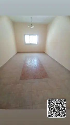 For annual rent: Two bedrooms, living room, and balcony in Al Rashidiya 1, Ajman.