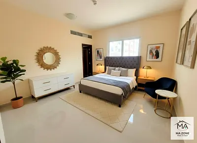 Biggest hall of muweillah in 2bhk with 3 bath in new condition like building