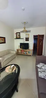 For Rent: 1-Bedroom + Living Room Apartment in Al Majaz 3 – Side View, Spacious Layout