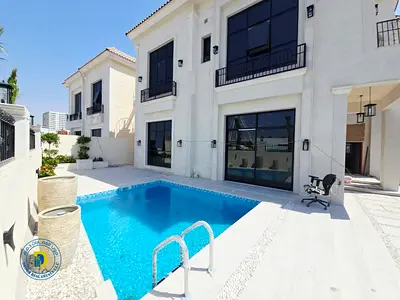 Luxury corner villa in Al Yasmin, 5 bedrooms and swimming pool, strategic location