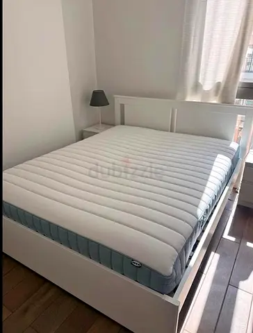 Its Ikea songisand queen size bed with 2 storage drawers and Ikea mattreess