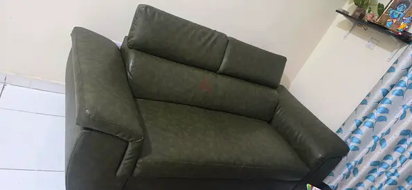 Good condition fully rexin covered wooden sofa 500