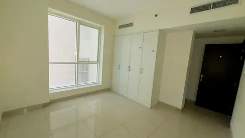 Limited offer: 2-bedroom apartment with living room in Al Majaz 2 for 45,000 AED. Family-friendly, prime location near all services.