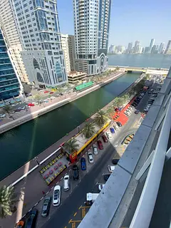 Three rooms and a hall in Al Qasba with a sea view and a balcony, spacious areas and excellent payme