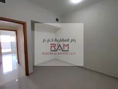 Two bedrooms and a living room in Gulf Tower, Emirates City