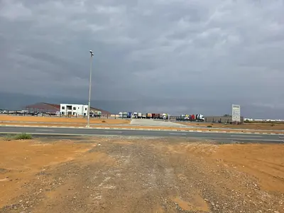 Investment Alert: 8,000 Sq. Ft. Yard on Main Road with AED 150K Expected Income.