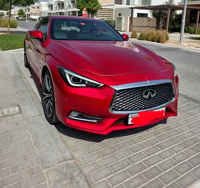 Red inifiniti 2.0 with white interior