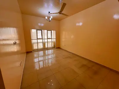 A bedroom and a living room, two bathrooms, a separate hall, central air conditioning, spacious areas, and a prime location close to schools and near