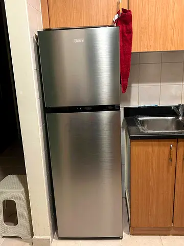 Midea medium size silver colour refrigerator same like new