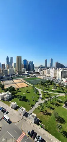 For Sale 3-Bedroom Apartment with Spacious Living Room and Stunning Front Garden View in Al Majaz 3