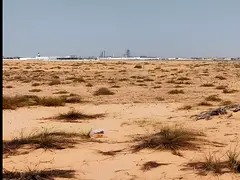 For sale: a fenced area in Al Sajaa Industrial Area, inside the scrap yard.