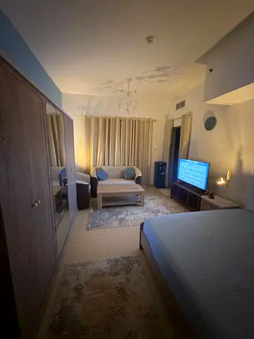 Fully furnished studio for monthly rent in Al Yasmeen Towers, Al Jurf 2, opposite City Centre Ajman. Large space, balcony, all bills included.