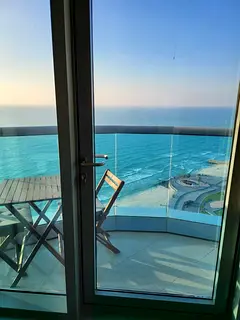 Furnished 2BHK for monthly rent in Corniche Residence Ajman, full sea view, all bills, gym, pool, pa