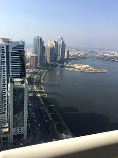 A two-bedroom apartment with a living room for sale, featuring a stunning sea view, located in Burj