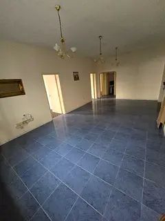 Annual rent apartment in Al Majaz 3, featuring 3 bedrooms and a living room with a large area and 2