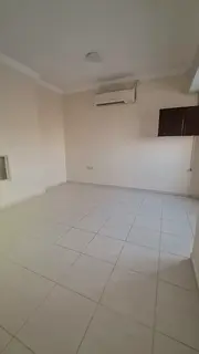 Studio for rent in Al Musalla bachelors large space split AC AED 18000 4 payments 1000 deposit