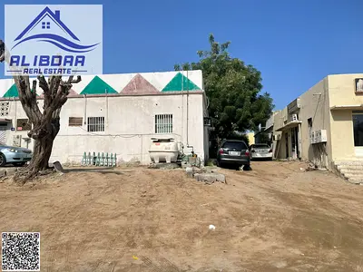بيت عربي للبيع بعجمان زاويه شارعين وسكه