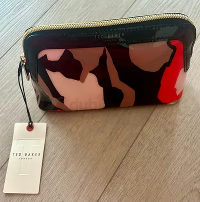 Nice New Ted baker pouch with labels.