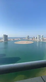 1 bedroom with balcony, parking and Mamzer lake full view for sale in Al Waha residence tower ,Sharj