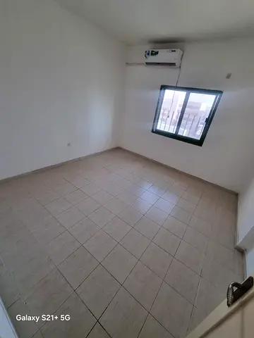 For annual rent in Sharjah, specifically in Al Majaz area: 2 bedrooms, a living room, 2 bathrooms, and 2 balconies with an excellent area.