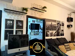 For sale: a room, a living room, two bathrooms, and a parking space inside the building