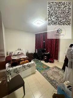 Two bedrooms and a living room in The Orient, Al Rashidiya.