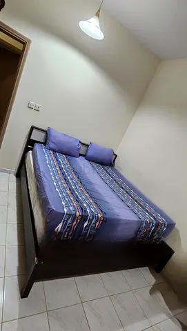 Comfortable King-Sized Bed with Stylish Bed Frame