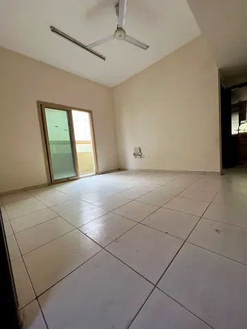 Bedroom and living room in Al Naba’ah, family only, balcony, central AC and gas, rent AED 25,000, 4 cheques.
