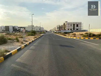 For sale in Sharjah Al Hoshi area Residential investment plot of land, area 10080 feet Very distinguished location, corner on two streets