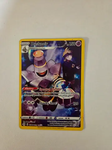 Pokémon Dusknoir with Trainer Ultra Rare