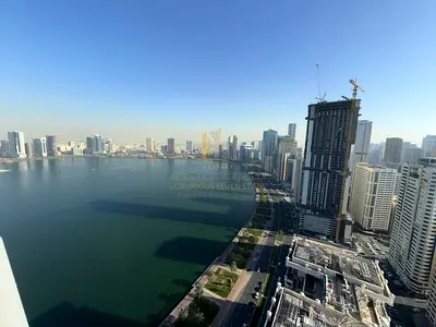 للبيع شقة غرفتين وصالة مع اطلالة جانبية في برج الدانة