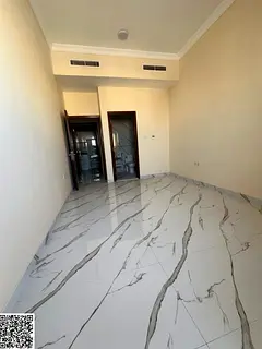 One bedroom, living room, two bathrooms, balcony with open view, near Mohammed Bin Zayed exit.