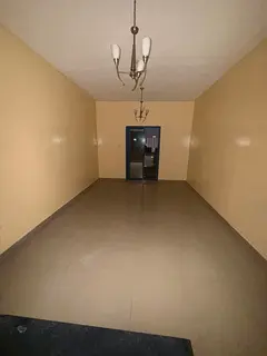 💯 Annual Rent in Ajman 💦 Spacious Studio Apartment with American-Style Kitchen, Balcony, and C