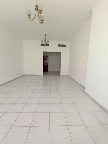 Apartment for rent in Al Jubail Sharjah two bedrooms hall 2 master bathrooms central AC near bus station 39000 yearly 4 or 6 payments