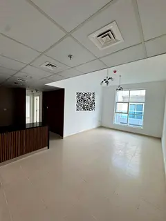 Two-bedroom apartment for sale in Ajman, City Towers. Total asking price: AED 563,307 (including 10%