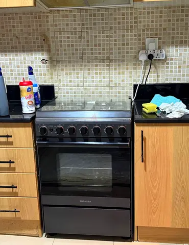 Toshiba 60x60 Cm, 4 Burner Gas Cooking Range Stainless Steel Top And Front TBA-24BMG4G089KS-SA Black