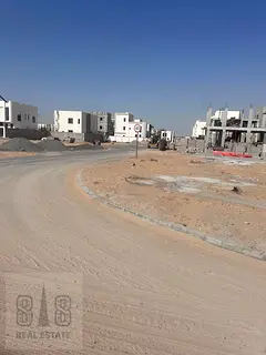 Investment opportunity: Corner plot of land in a prime location in Al-Haliou 2