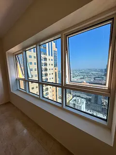 For annual rent in Sharjah, specifically in the Al Taawun area: two bedrooms, a living room, central