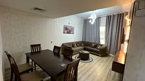 Furnished 2-bedroom apartment for monthly rent in Al Jurf 2 Ajman, Garden City Towers, spacious, uti