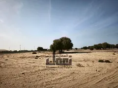 A premium residential plot is available for sale within a modern, master-planned community offering