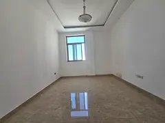Two bedrooms and a living room in Al Rashidiya, near the Ladies' Park. Large area.