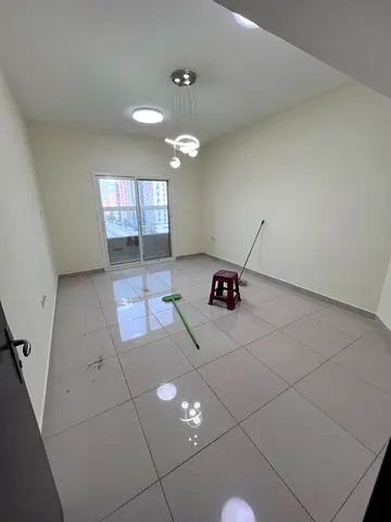 One bedroom, living room, two bathrooms, balcony with a fully open view, and free gym access.