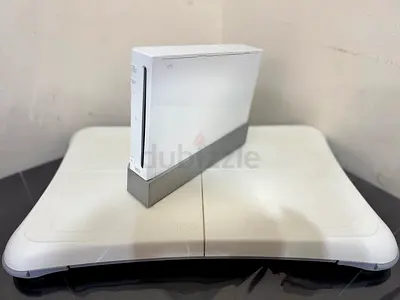 Nintendo Wii Console with Wii fit plus and games
