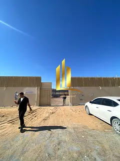 For sale in Al Sajaa Industrial, a fenced building with a canopy for the exclusive price of 1,900,00