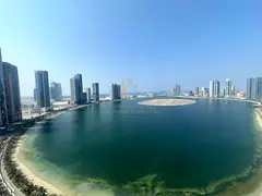 Apartment for sale in Al Waha Residences luxurious tower on the first row of the lake