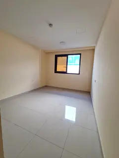 Two bedroom apartment with living room in Sharjah Al Qulayaa. Clean unit with central AC, built in w