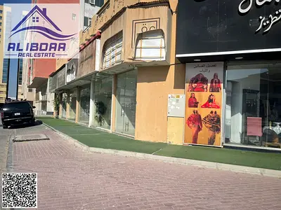 Commercial shops with mezzanine for rent in Ajman, Al Hamidiya area.